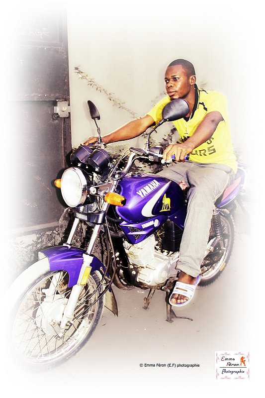 Man on motorbike (in Congo, Africa)